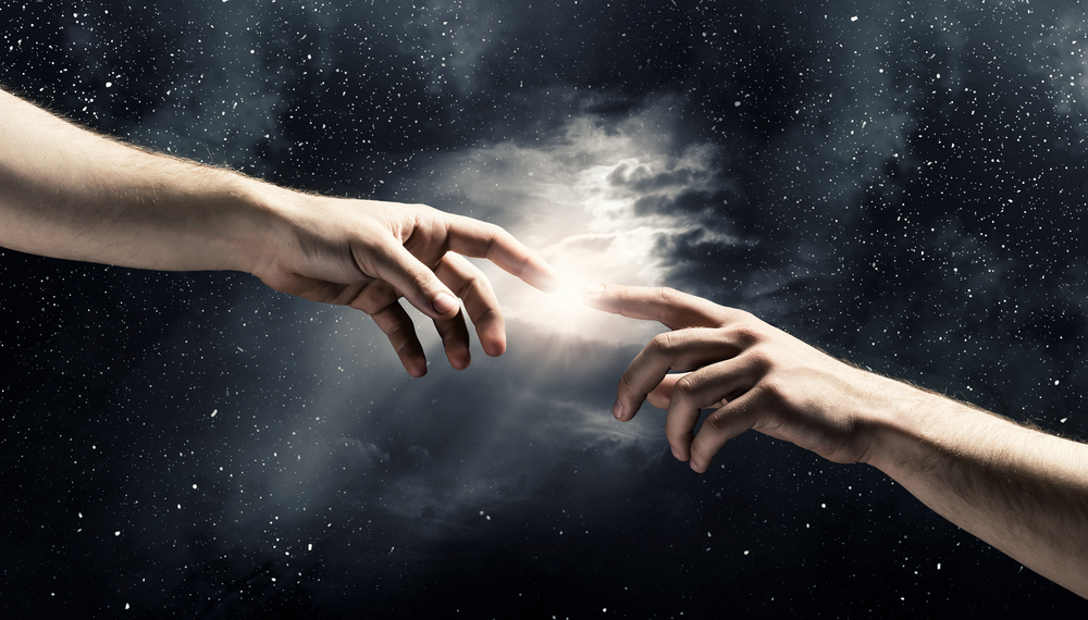 Close up of human hands touching with fingers